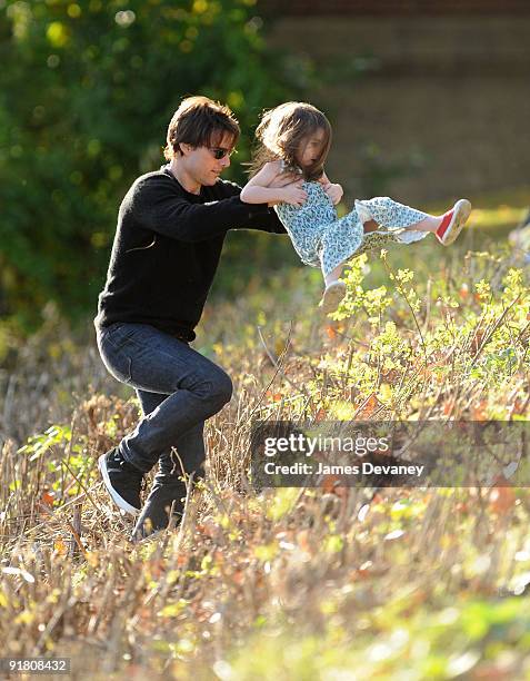 Tom Cruise and Suri Cruise visit Charles River Basin on October 10, 2009 in Cambridge, Massachusetts.