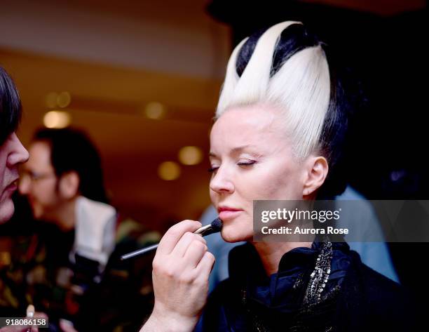 Daphne Guinness getting made up Backstage at The Blonds Runway show at Spring Studios on February 13, 2018 in New York City.