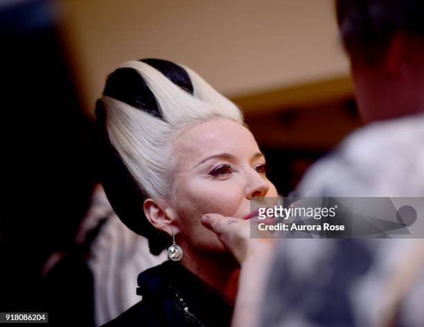 Daphne Guinness getting made up Backstage at The Blonds Runway show at Spring Studios on February 13, 2018 in New York City.