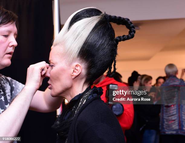 Daphne Guinness getting made up Backstage at The Blonds Runway show at Spring Studios on February 13, 2018 in New York City.