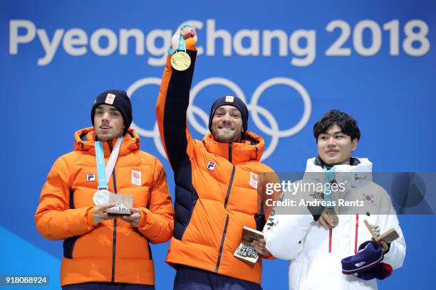 Silver medalist Patrick Roest of the Netherlands, gold medalist Kjeld Nuis of the Netherlands and bronze medalist Min Seok Kim of Korea pose during...