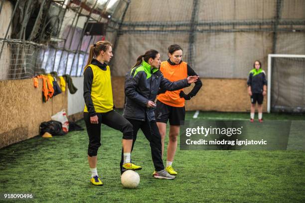 coaching soccer - female coach stock pictures, royalty-free photos & images