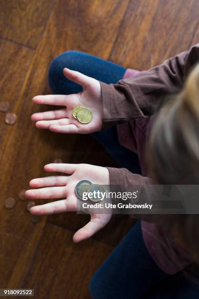 Bonn, Germany Five-year old girl shows her pocket money on February 03, 2018 in Bonn, Germany.