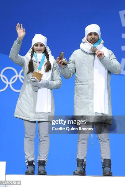 Bronze medalists Anastasia Bryzgalova and Aleksandr Krushelnitckii of Olympic Athletes from Russia pose during the medal ceremony for Curling Mixed...