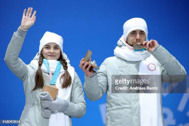 Bronze medalists Anastasia Bryzgalova and Aleksandr Krushelnitckii of Olympic Athletes from Russia pose during the medal ceremony for Curling Mixed...