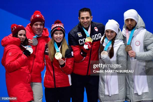 Switzerland's silver medallists Jenny Perret and Martin Rios, Canada's gold medallists Kaitlyn Lawes and John Morris and Russia's bronze medallist...