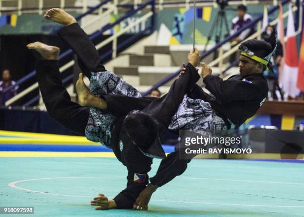 Almohaidib Abad and Alfau Jan Abad of Philippines perform during men's double final of Asian Games 2018 test event in Jakarta on February 14, 2018. /...