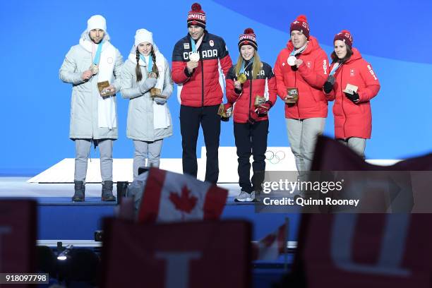 Bronze medalists Aleksandr Krushelnitckii and Anastasia Bryzgalova of Olympic Athletes from Russia, gold medalists John Morris and Kaitlyn Lawes of...