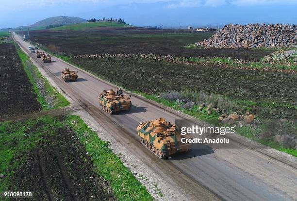 Photo taken from Turkey's Hatay province shows military vehicles are being transported to border units as artillery units of Turkish Armed Forces...