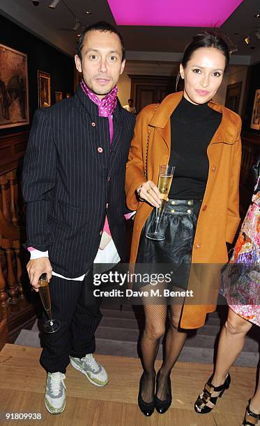 Dan Macmillan and partner attend the Graff charity auction and reception in aid of F.A.C.E.T. , at Christie's on October 12, 2009 in London, England.