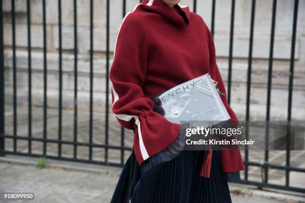 Buying Manager at Selfridges Jeannie Lee wears a Sacai skirt and sweater dress day 6 of Paris Womens Fashion Week Spring/Summer 2018, on October 1,...