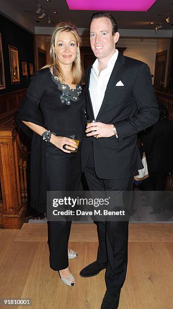 Nadja Swarovski and Rupert Adams attend the Graff charity auction and reception in aid of F.A.C.E.T. , at Christie's on October 12, 2009 in London,...