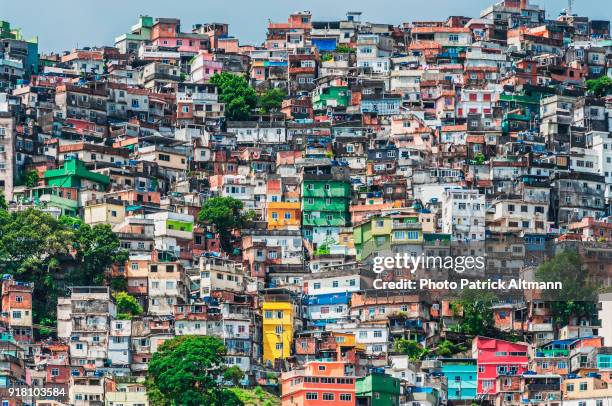 rio de janeiro's rocinha is the largest shanty town in south america - brazil rio stock pictures, royalty-free photos & images