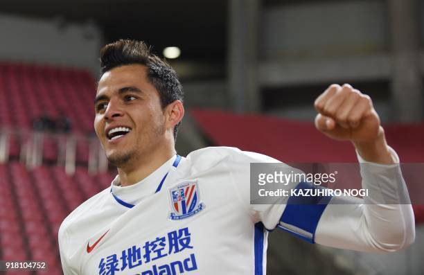 China's Shanghai Shenhua player Giovanni Moreno celebrates his goal during a group stage football match against Japan's Kashima Antlers in Kashima,...