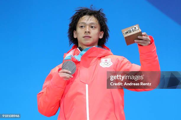 Silver medalist Ayumu Hirano of Japan poses during the medal ceremony for the Snowboard Men's Halfpipe Final on day five of the PyeongChang 2018...