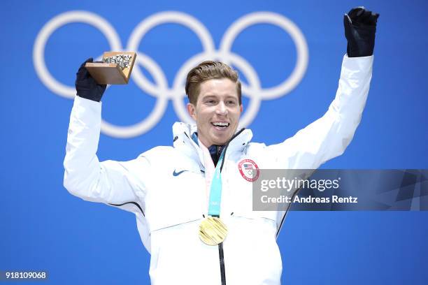 Gold medalist Shaun White of the United States poses during the medal ceremony for the Snowboard Men's Halfpipe Final on day five of the PyeongChang...