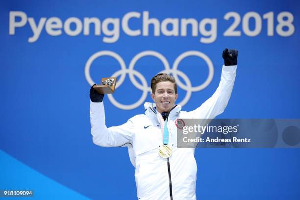 Gold medalist Shaun White of the United States poses during the medal ceremony for the Snowboard Men's Halfpipe Final on day five of the PyeongChang...