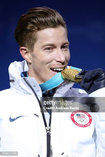 Silver medalist Ayumu Hirano of Japan, gold medalist Shaun White of the United States and bronze medalist Scotty James of Australia pose during the...