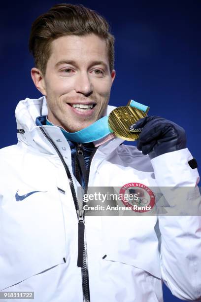 Gold medalist Shaun White of the United States poses during the medal ceremony for the Snowboard Men's Halfpipe Final on day five of the PyeongChang...