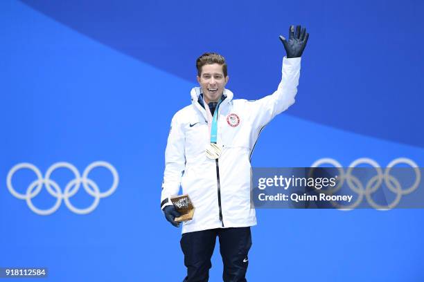Gold medalist Shaun White of the United States poses during the medal ceremony for the Snowboard Men's Halfpipe Final on day five of the PyeongChang...