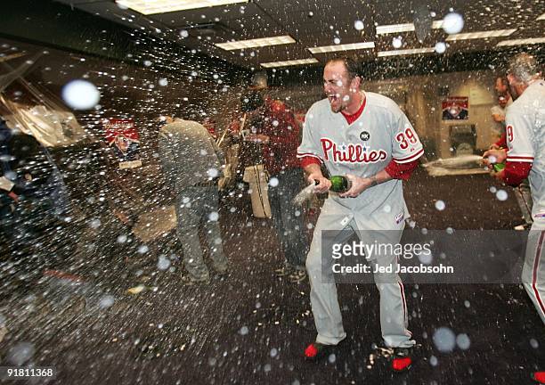 Brett Myers of the Philadelphia Phillies sprays champagne in the locker room after the victory against the Colorado Rockies in Game Four of the NLDS...