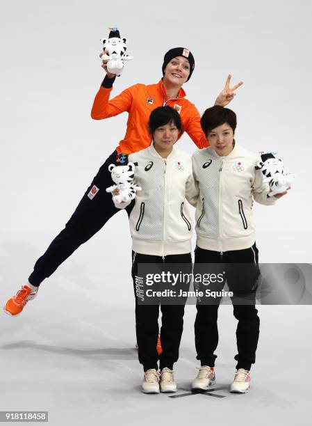 Jorien Ter Mors of the Netherlands celebrates winning the gold medal with silver medallist Nao Kodaira of Japan and bronze medallist Miho Takagi of...