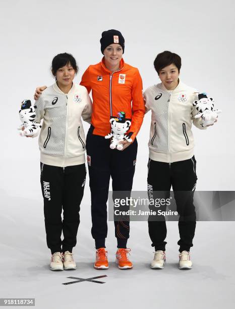 Jorien Ter Mors of the Netherlands celebrates winning the gold medal with silver medallist Nao Kodaira of Japan and bronze medallist Miho Takagi of...