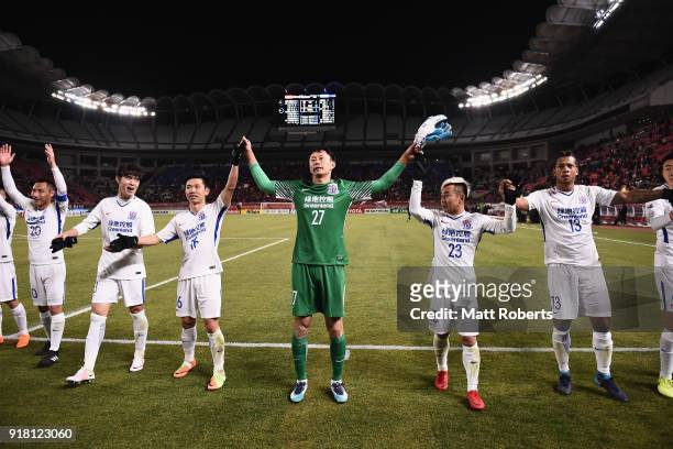 Shanghai Shenhua players applaud supporters after their 1-1 draw in the AFC Champions League Group H match between Kashima Antlers and Shanghai...