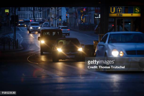 Berlin, Germany Cars drive at dawn on a street in Berlin Neukoelln on February 14, 2018 in Berlin, Germany.