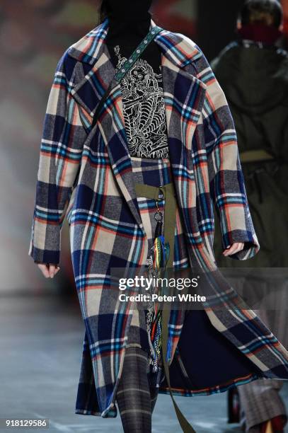 Model, fashion detail, walks the runway at the Vivienne Tam show during New York Fashion Week at Gallery I at Spring Studios on February 13, 2018 in...