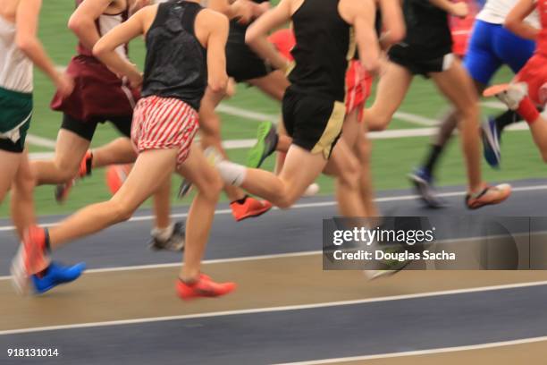 close-up of runners on a race track - leap of faith activity bildbanksfoton och bilder