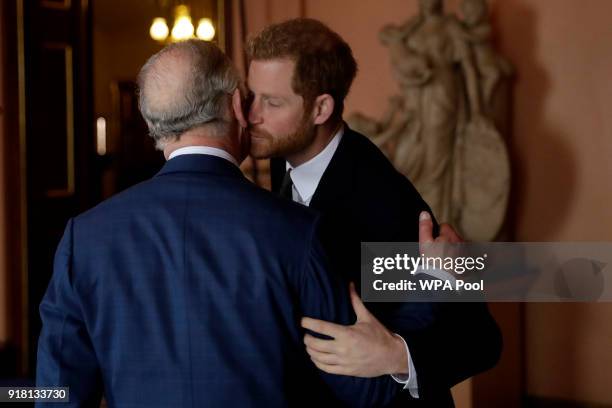 Prince Harry and Prince Charles, Prince of Wales arrive to attend the 'International Year of The Reef' 2018 meeting at Fishmongers Hall on February...