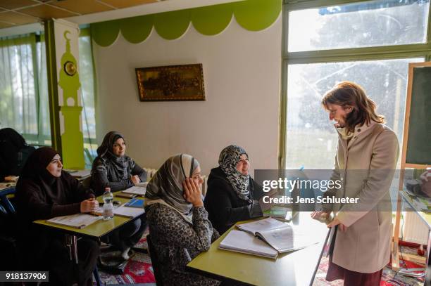 Aydan Ozoguz , German Federal Commissioner for Immigration, Refugees and Integration meets muslim women from Syria as she visits the Muslim cultural...