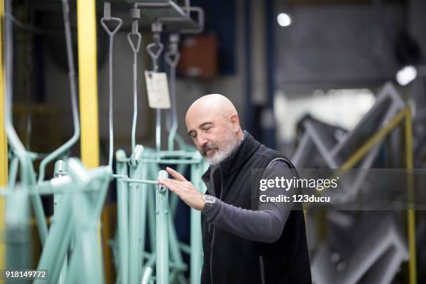 bicycle factory quality control - 123ducu stock pictures, royalty-free photos & images