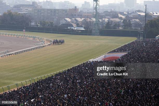 Jockeys compete the Race 7 Goodluck Handicap. General view of the main stand at Nakayama Racecourse on December 28, 2014 in Funabashi, Chiba, Japan....