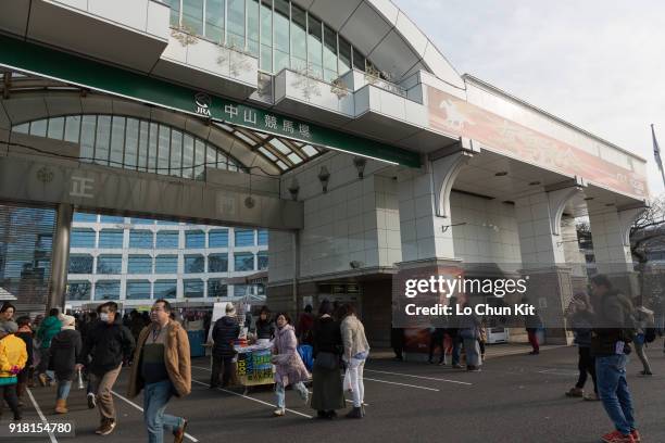 People at the main entrance at Nakayama Racecourse during Arima Kinen Race Day on December 28, 2014 in Funabashi, Chiba, Japan. More than 115,000...