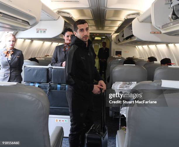 Henrikh Mkhitaryan of Arsenal boards the team flight at Luton Airport on February 14, 2018 in Luton, United Kingdom.