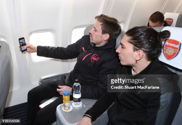 Arsenal's Nacho Monreal and Hector Bellerin on the team flight at Luton Airport on February 14, 2018 in Luton, United Kingdom.