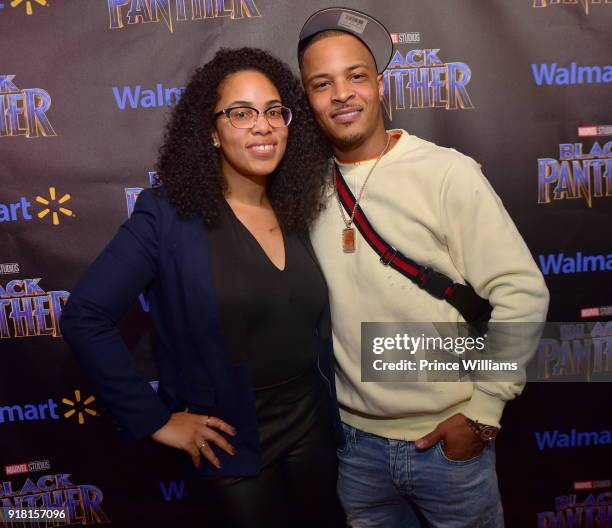 Regina Moore and T.I. Attend "Black Panther" advance Screening at Regal Hollywood on February 13, 2018 in Chamblee, Georgia.