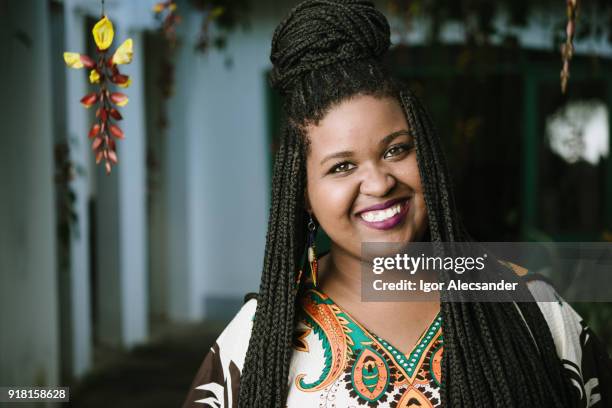 proud afro young woman - braided buns stock pictures, royalty-free photos & images