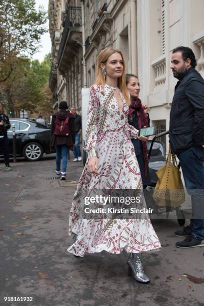 Model Natalia Vodianova wears a Valentino dress day 6 of Paris Womens Fashion Week Spring/Summer 2018, on October 1, 2017 in London, England.