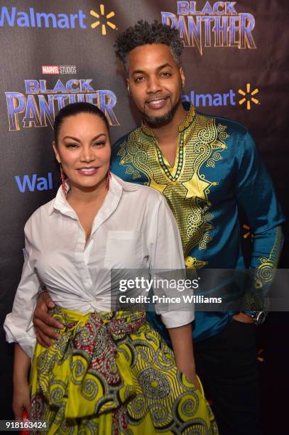 Egypt Sherrod and DJ Fadelf attend "Black Panther" Advance Screening at Regal Hollywood on February 13, 2018 in Chamblee, Georgia.