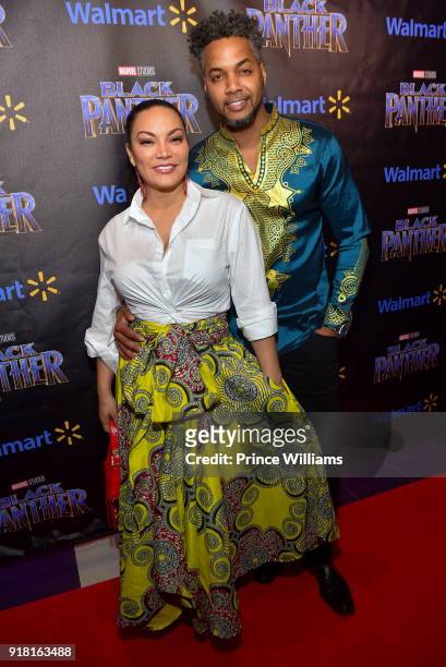 Egypt Sherrod and DJ Fadelf attend "Black Panther" Advance Screening at Regal Hollywood on February 13, 2018 in Chamblee, Georgia.