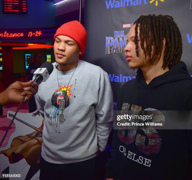 Messiah Harris and Domani Harris attend "Black Panther" Advance Screeing at Regal Hollywood on February 13, 2018 in Chamblee, Georgia.