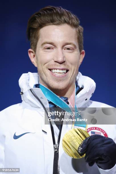 Gold medalist Shaun White of the United States poses during the medal ceremony for the Snowboard Men's Halfpipe Final on day five of the PyeongChang...