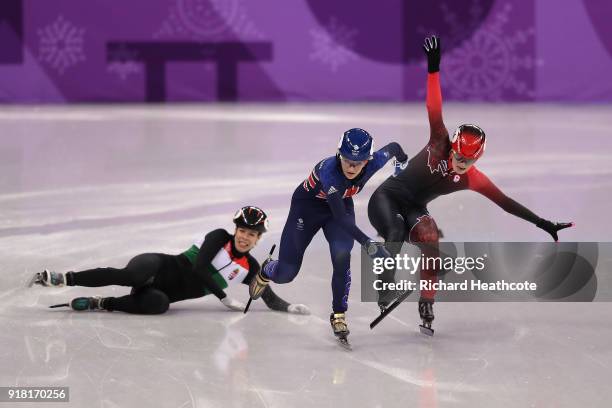 Elise Christie of Great Britain and Kim Boutin of Canada collide as Andrea Keszler of Hungary falls during the Ladies' 500m Short Track Speed Skating...