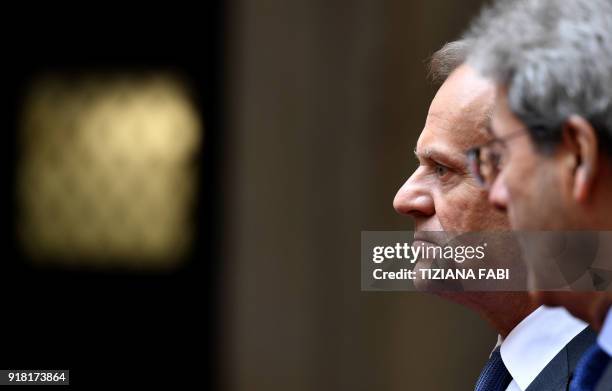 Italian Prime Minister Paolo Gentiloni welcomes European Council President Donald Tusk as he arrives for a meeting at the Palazzo Chigi in Rome on...