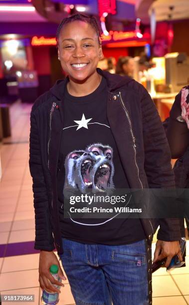 Melissa Scott attends "Black Panther" advance screeing at Regal Hollywood on February 13, 2018 in Chamblee, Georgia.