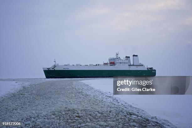 The cargo ship "Baltica' navigating the recently opened ice channel into Kemi port. The 'Sampo' is an Ice-breaker that was built in 1961 by the...