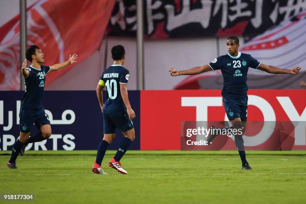 Buriram United players Ratthanakorn Maikami , Jakkaphan Kaewprom and Edgar celebrate a goal during their AFC Champions League group stage football...